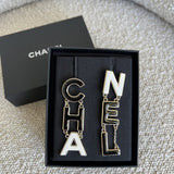 CHANEL Earrings Gold Cha-nel  Earrings Black, White and Gold - Redeluxe