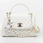 CHANEL Handbag 20K Iridescent White Caviar Quilted Coco Handle Medium Light Gold Hardware - Redeluxe