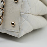 CHANEL Handbag 20K Iridescent White Caviar Quilted Coco Handle Medium Light Gold Hardware - Redeluxe
