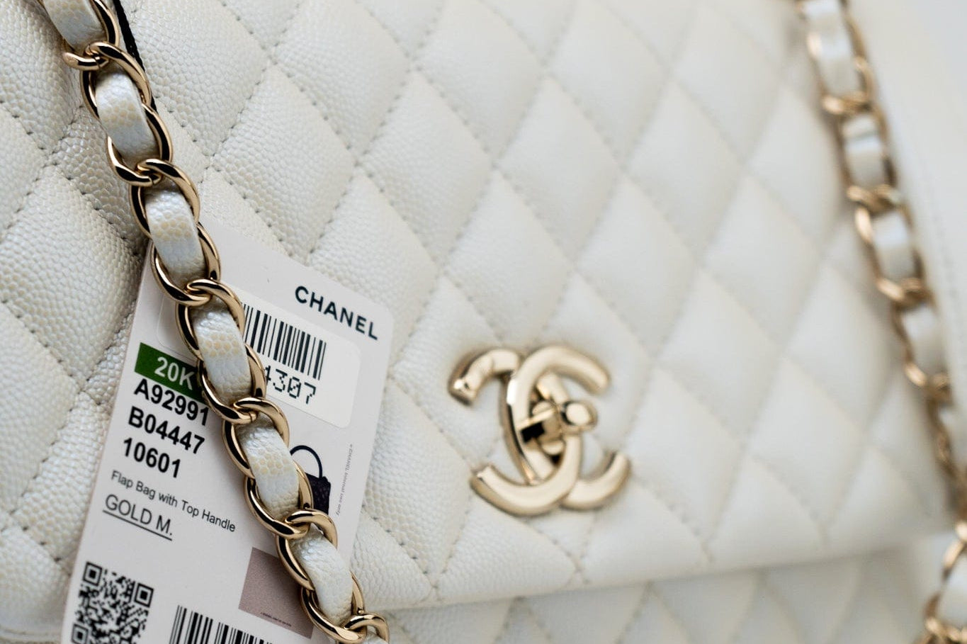 CHANEL Handbag 20K Iridescent White Caviar Quilted Coco Handle Medium Light Gold Hardware - Redeluxe