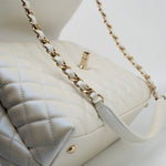 CHANEL Handbag 20K Iridescent White Caviar Quilted Coco Handle Medium Light Gold Hardware - Redeluxe