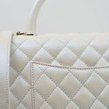 CHANEL Handbag 20K Iridescent White Caviar Quilted Coco Handle Medium Light Gold Hardware - Redeluxe
