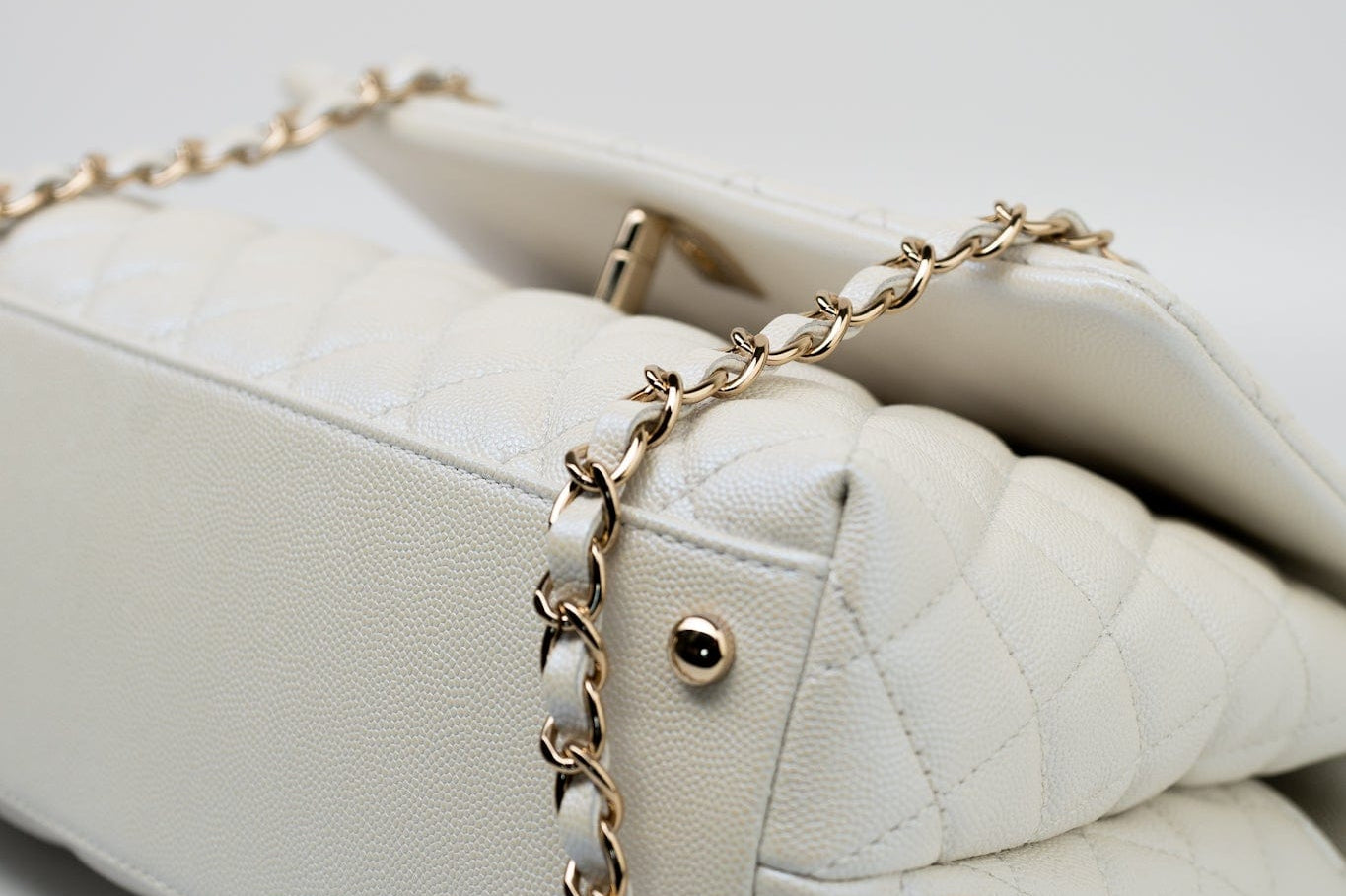 CHANEL Handbag 20K Iridescent White Caviar Quilted Coco Handle Medium Light Gold Hardware - Redeluxe