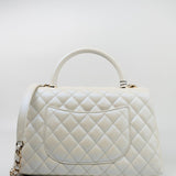 CHANEL Handbag 20K Iridescent White Caviar Quilted Coco Handle Medium Light Gold Hardware - Redeluxe