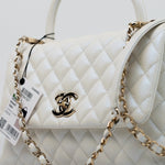 CHANEL Handbag 20K Iridescent White Caviar Quilted Coco Handle Medium Light Gold Hardware - Redeluxe