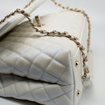 CHANEL Handbag 20K Iridescent White Caviar Quilted Coco Handle Medium Light Gold Hardware - Redeluxe