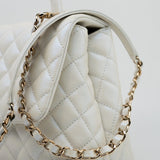 CHANEL Handbag 20K Iridescent White Caviar Quilted Coco Handle Medium Light Gold Hardware - Redeluxe