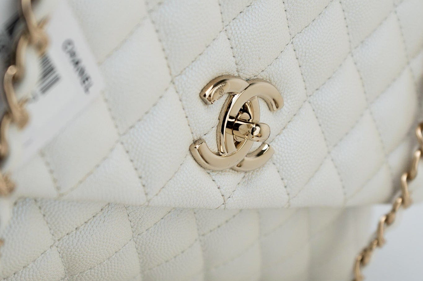CHANEL Handbag 20K Iridescent White Caviar Quilted Coco Handle Medium Light Gold Hardware - Redeluxe
