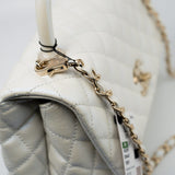 CHANEL Handbag 20K Iridescent White Caviar Quilted Coco Handle Medium Light Gold Hardware - Redeluxe
