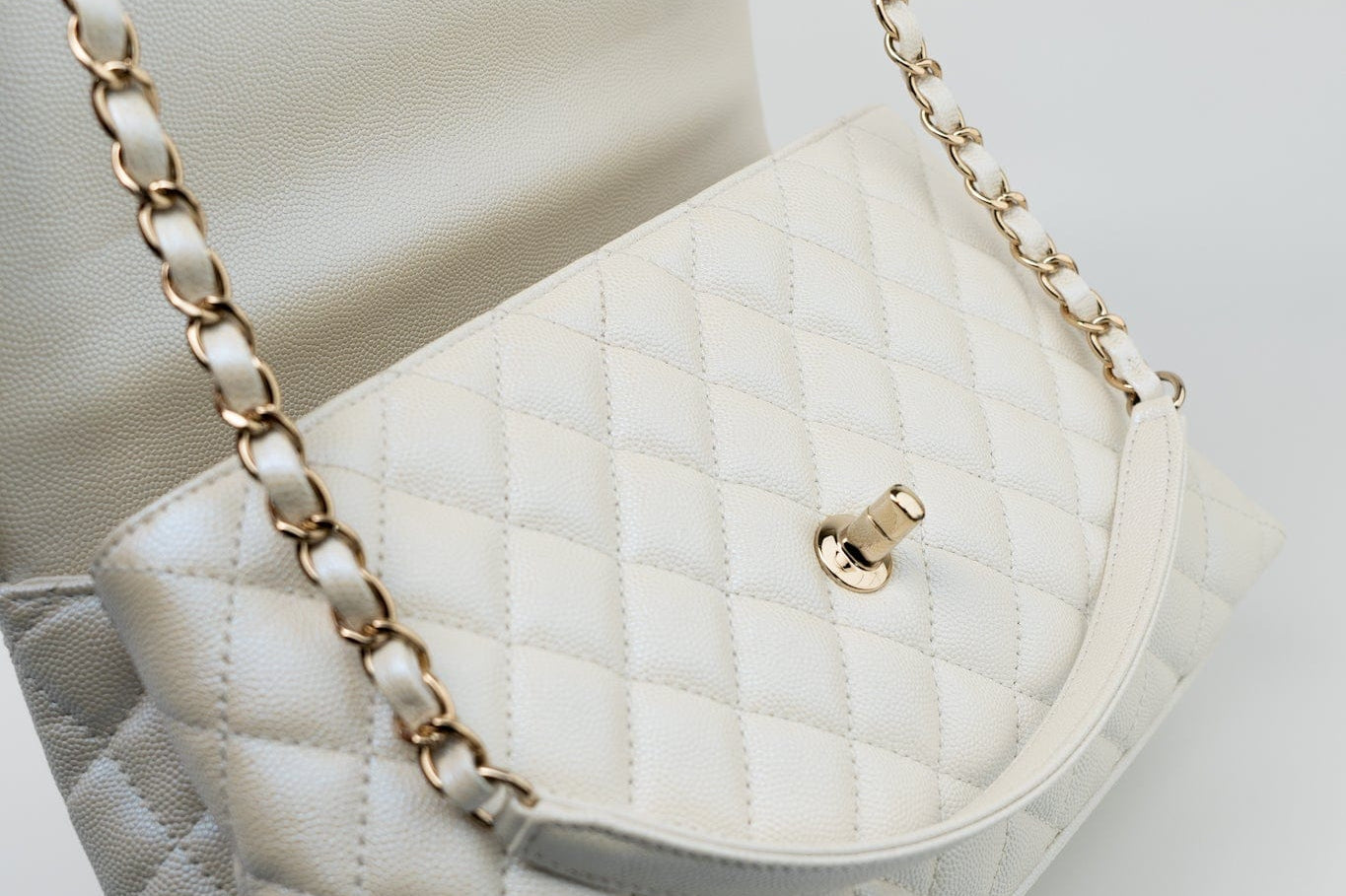 CHANEL Handbag 20K Iridescent White Caviar Quilted Coco Handle Medium Light Gold Hardware - Redeluxe