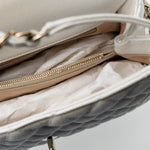 CHANEL Handbag 20K Iridescent White Caviar Quilted Coco Handle Medium Light Gold Hardware - Redeluxe