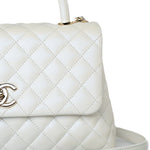 CHANEL Handbag 20K Iridescent White Caviar Quilted Coco Handle Medium Light Gold Hardware - Redeluxe