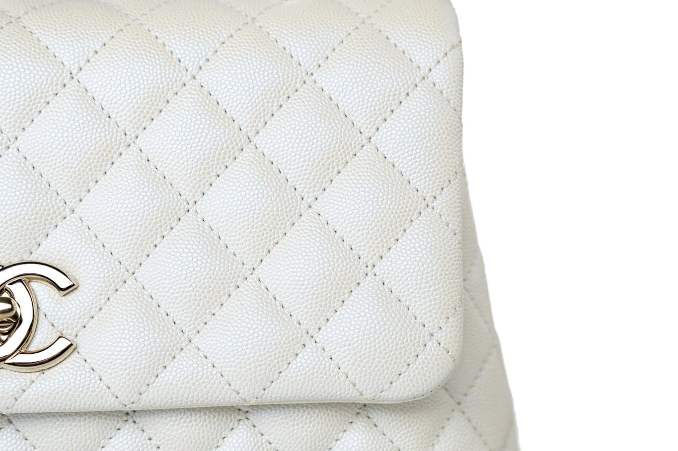 CHANEL Handbag 20K Iridescent White Caviar Quilted Coco Handle Medium Light Gold Hardware - Redeluxe