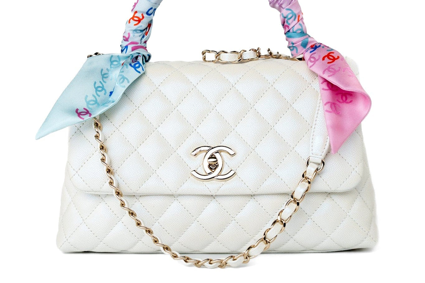 CHANEL Handbag 20K Iridescent White Caviar Quilted Coco Handle Medium Light Gold Hardware - Redeluxe