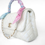 CHANEL Handbag 20K Iridescent White Caviar Quilted Coco Handle Medium Light Gold Hardware - Redeluxe