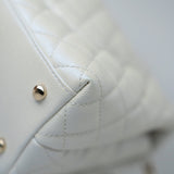 CHANEL Handbag 20K Iridescent White Caviar Quilted Coco Handle Medium Light Gold Hardware - Redeluxe