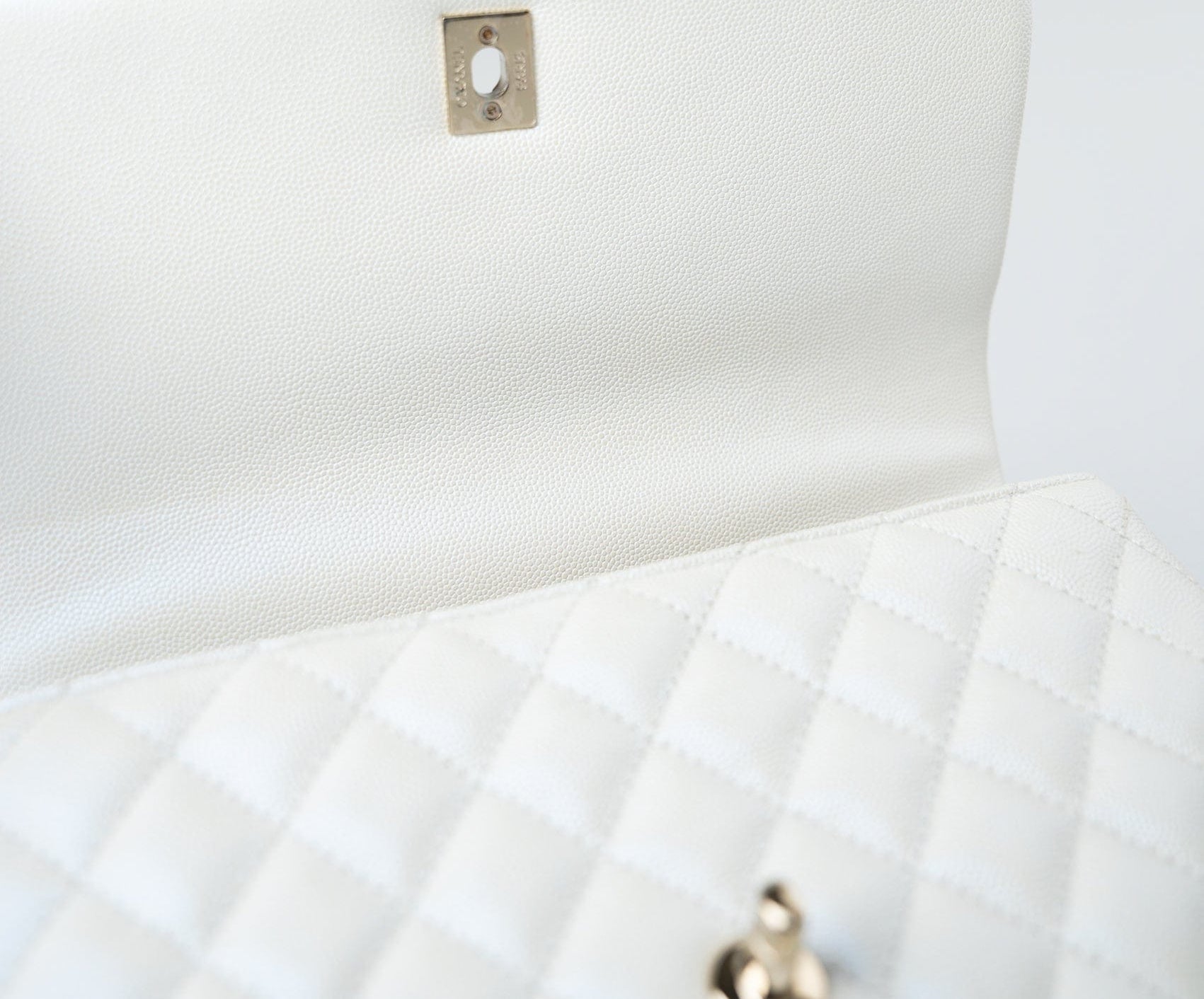 CHANEL Handbag 20K Iridescent White Caviar Quilted Coco Handle Medium Light Gold Hardware - Redeluxe