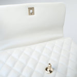CHANEL Handbag 20K Iridescent White Caviar Quilted Coco Handle Medium Light Gold Hardware - Redeluxe