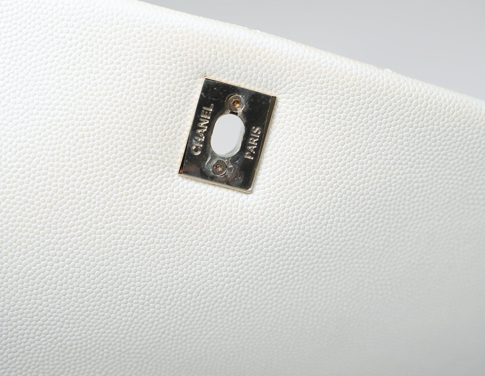 CHANEL Handbag 20K Iridescent White Caviar Quilted Coco Handle Medium Light Gold Hardware - Redeluxe