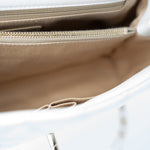 CHANEL Handbag 20K Iridescent White Caviar Quilted Coco Handle Medium Light Gold Hardware - Redeluxe