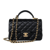 CHANEL Handbag 21A Black Lambskin Quilted Mini Top Handle Antique Gold Hardware - Redeluxe