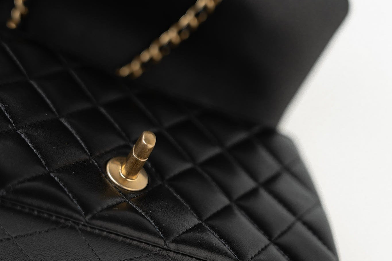 CHANEL Handbag 21A Black Lambskin Quilted Mini Top Handle Antique Gold Hardware - Redeluxe