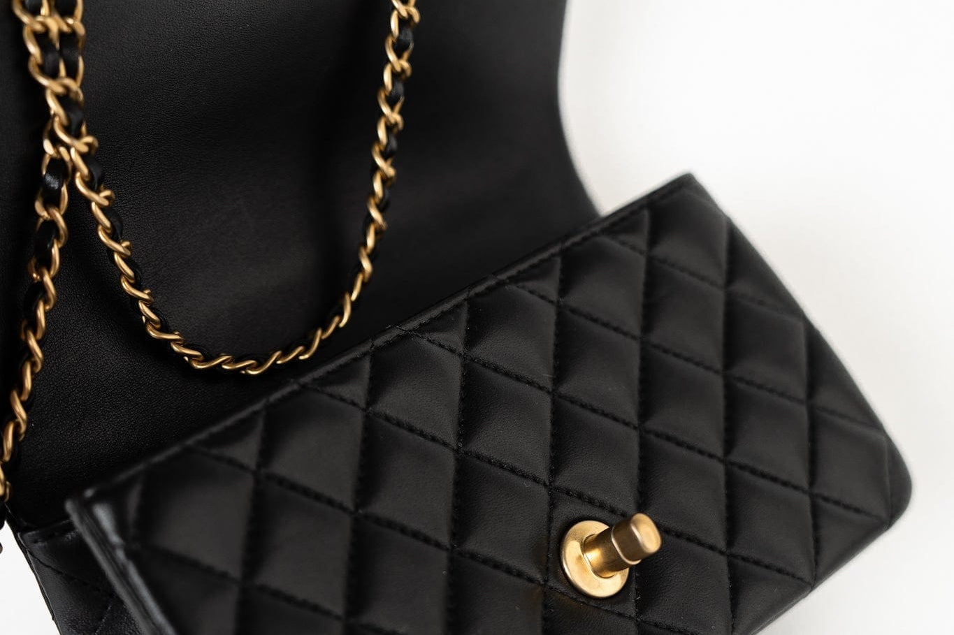 CHANEL Handbag 21A Black Lambskin Quilted Mini Top Handle Antique Gold Hardware - Redeluxe