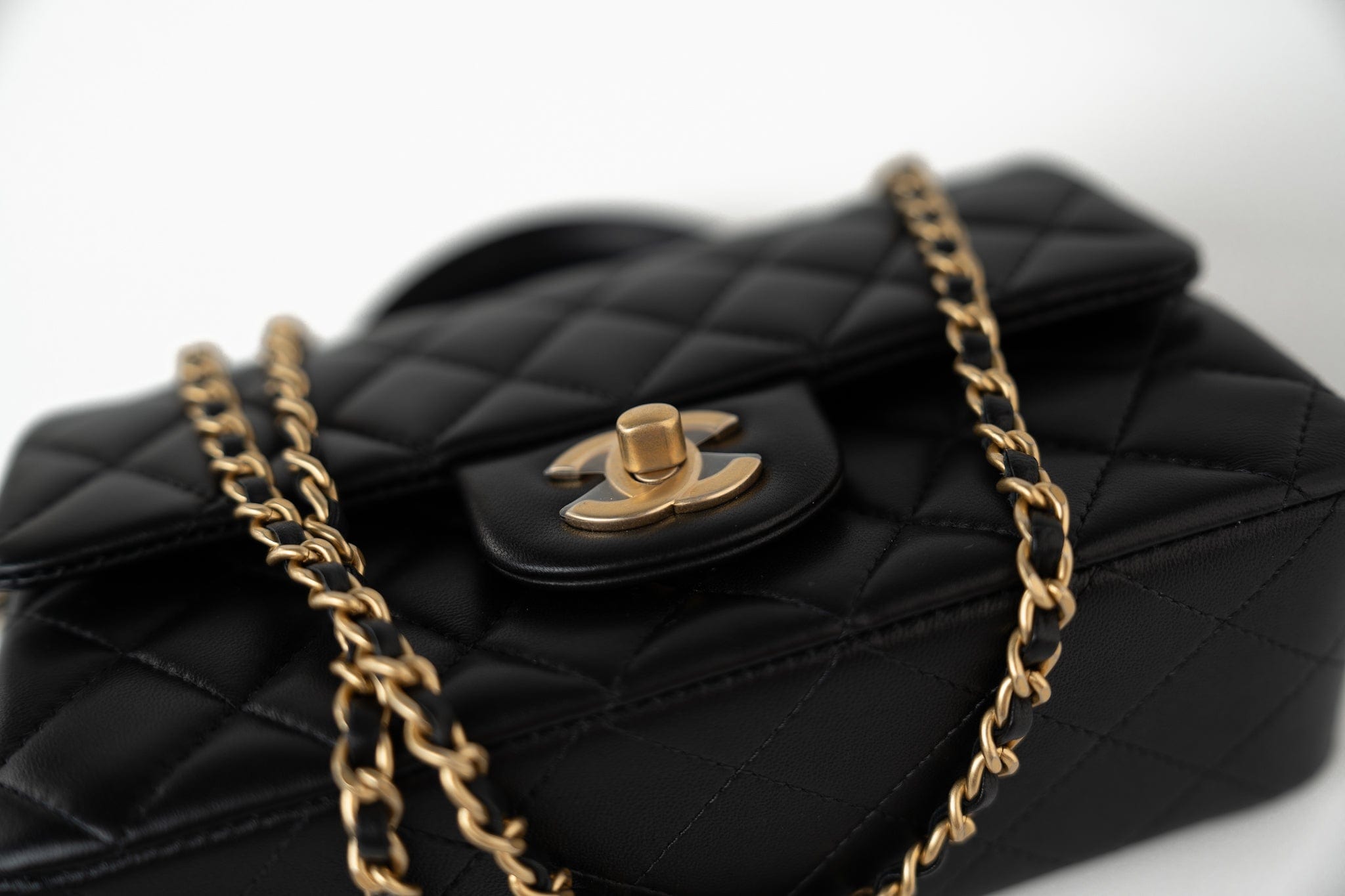 CHANEL Handbag 21A Black Lambskin Quilted Mini Top Handle Antique Gold Hardware - Redeluxe