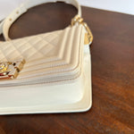 CHANEL Handbag 21A White Caviar Quilted Small Boy Bag LGHW - Redeluxe