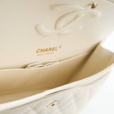 CHANEL Handbag 21A White/ Ivory Caviar Quilted Classic Flap Medium Light Gold Hardware - Redeluxe