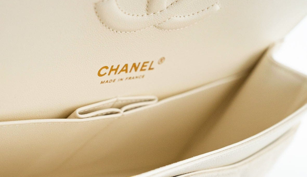 CHANEL Handbag 21A White/ Ivory Caviar Quilted Classic Flap Medium Light Gold Hardware - Redeluxe