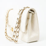 CHANEL Handbag 21A White/ Ivory Caviar Quilted Classic Flap Medium Light Gold Hardware - Redeluxe