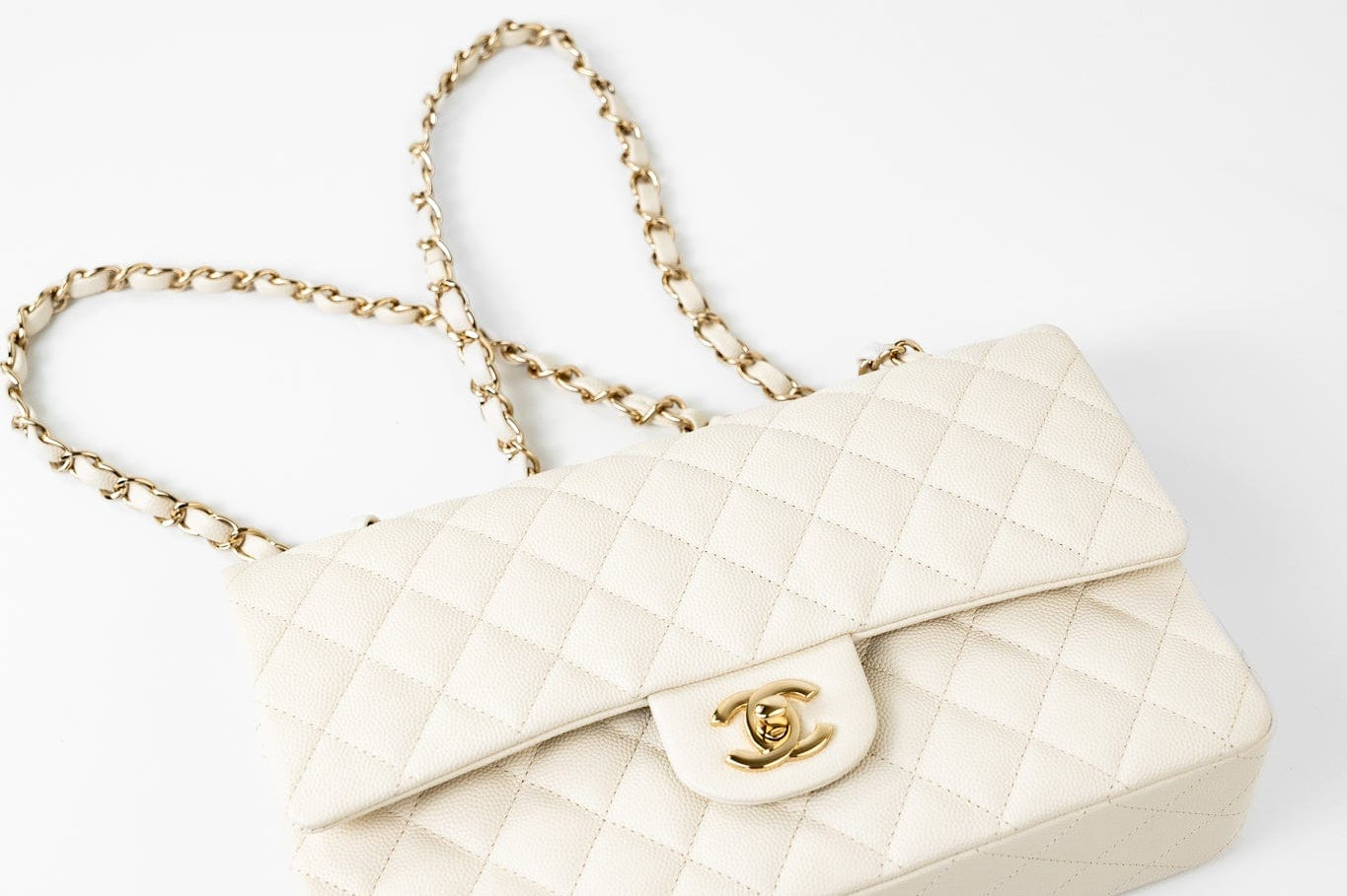 CHANEL Handbag 21A White/ Ivory Caviar Quilted Classic Flap Medium Light Gold Hardware - Redeluxe