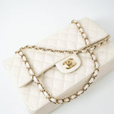 CHANEL Handbag 21A White/ Ivory Caviar Quilted Classic Flap Medium Light Gold Hardware - Redeluxe