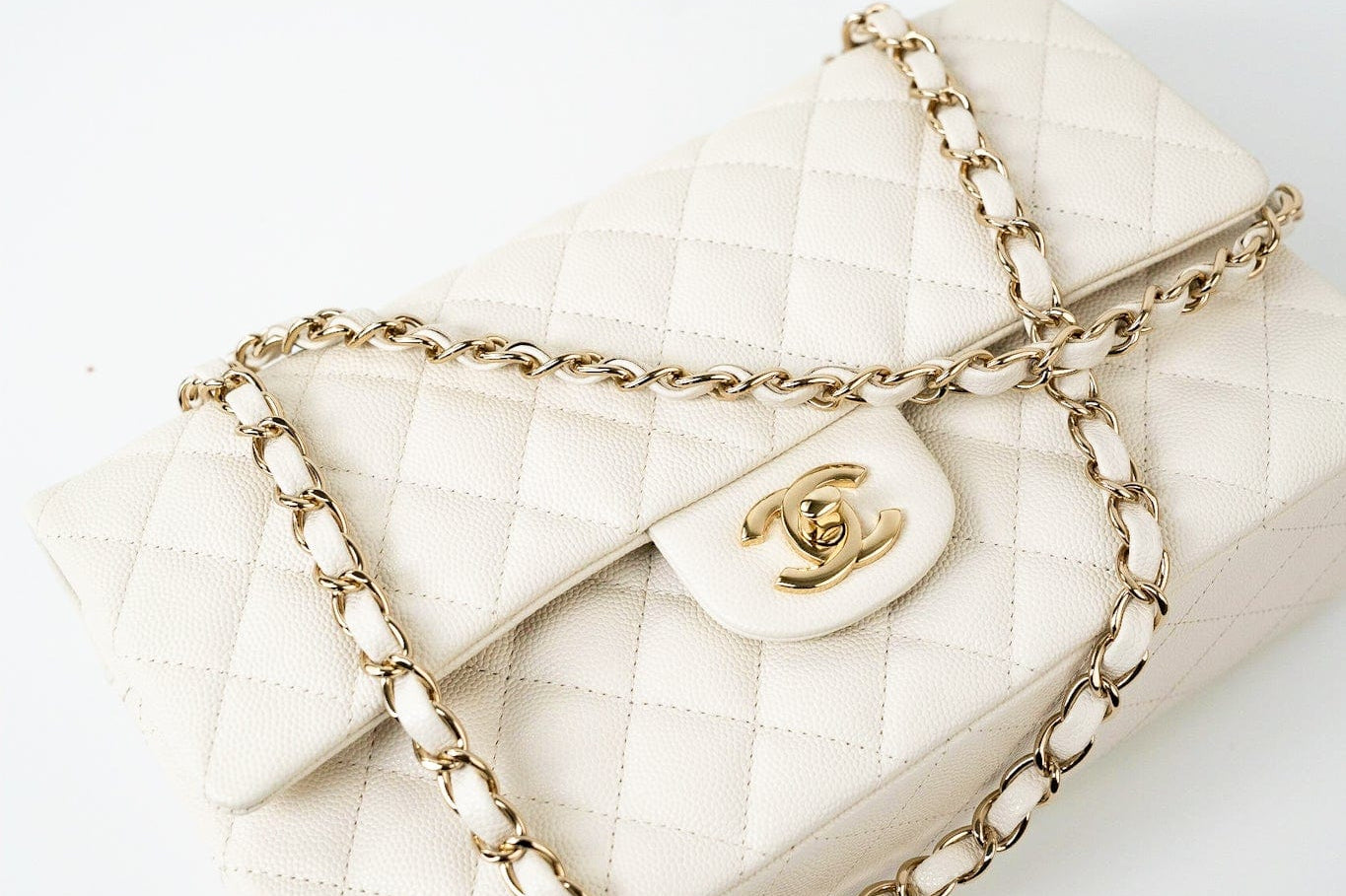 CHANEL Handbag 21A White/ Ivory Caviar Quilted Classic Flap Medium Light Gold Hardware - Redeluxe
