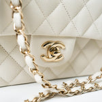 CHANEL Handbag 21A White/ Ivory Caviar Quilted Classic Flap Medium Light Gold Hardware - Redeluxe