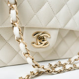 CHANEL Handbag 21A White/ Ivory Caviar Quilted Classic Flap Medium Light Gold Hardware - Redeluxe