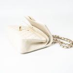 CHANEL Handbag 21A White/ Ivory Caviar Quilted Classic Flap Medium Light Gold Hardware - Redeluxe
