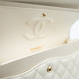 CHANEL Handbag 21A White/ Ivory Caviar Quilted Classic Flap Medium Light Gold Hardware - Redeluxe