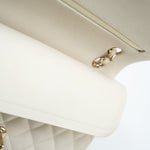 CHANEL Handbag 21A White/ Ivory Caviar Quilted Classic Flap Medium Light Gold Hardware - Redeluxe