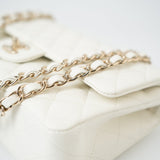 CHANEL Handbag 21A White/ Ivory Caviar Quilted Classic Flap Medium Light Gold Hardware - Redeluxe