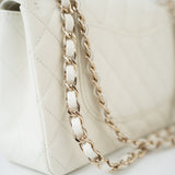 CHANEL Handbag 21A White/ Ivory Caviar Quilted Classic Flap Medium Light Gold Hardware - Redeluxe