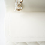 CHANEL Handbag 21A White/ Ivory Caviar Quilted Classic Flap Medium Light Gold Hardware - Redeluxe