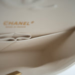 CHANEL Handbag 21A White/ Ivory Caviar Quilted Classic Flap Medium Light Gold Hardware - Redeluxe