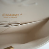 CHANEL Handbag 21A White/ Ivory Caviar Quilted Classic Flap Medium Light Gold Hardware - Redeluxe