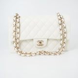 CHANEL Handbag 21A White/ Ivory Caviar Quilted Classic Flap Medium Light Gold Hardware - Redeluxe