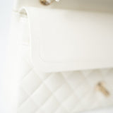 CHANEL Handbag 21A White/ Ivory Caviar Quilted Classic Flap Medium Light Gold Hardware - Redeluxe