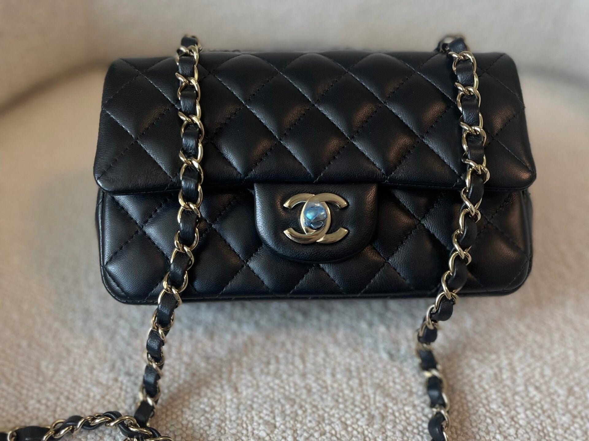 CHANEL Handbag 21K Black Lambskin Quilted Mini Rectangular Single Flap Light Gold Hardware - Redeluxe