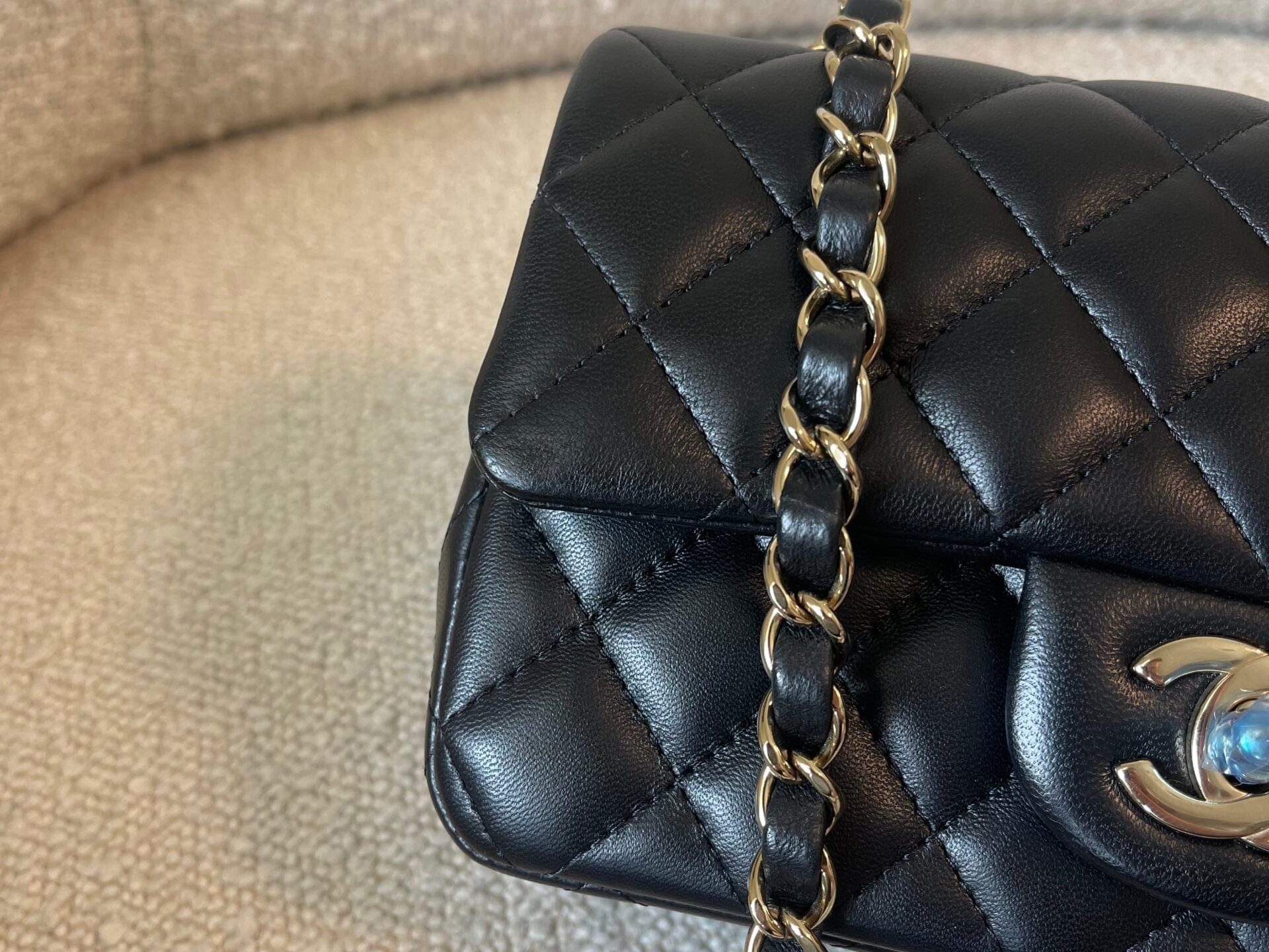 CHANEL Handbag 21K Black Lambskin Quilted Mini Rectangular Single Flap Light Gold Hardware - Redeluxe