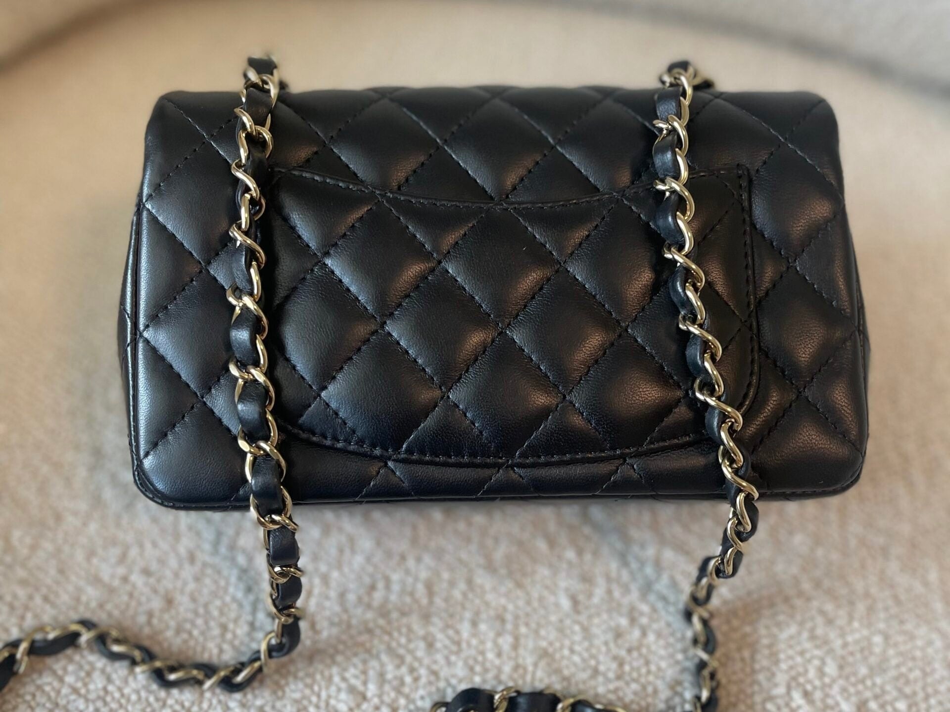 CHANEL Handbag 21K Black Lambskin Quilted Mini Rectangular Single Flap Light Gold Hardware - Redeluxe